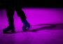 skates on ice rink purple lighting